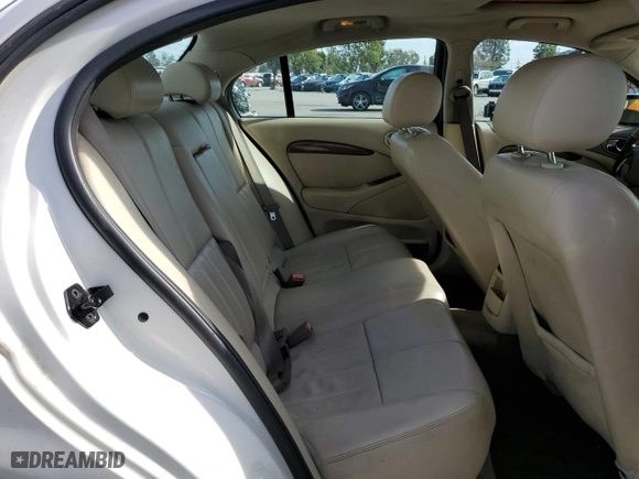 2004 Jaguar S-Type with VIN SAJEA01T34FN01609, listed as a Copart auction lot 45596495 with NaN miles and Salvage Title. Bid and sale history available at carsss.com. Image 10.