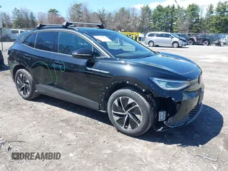 2022 Volkswagen ID.4 Pro S z VIN WVGGNPE24NP045603, wystawiony jako IAAI lot #42096900 z przebiegiem 66 966 mil mil oraz . Historia ofert i sprzedaży dostępna na DreamBid. Obrazek 1.