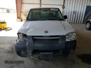 2002 Nissan Frontier XE with VIN 1N6DD26S02C309301, listed as a Copart auction lot 64142805 with 237,523 mi miles and Salvage title. Bid and sale history available at DreamBid. Image 5.
