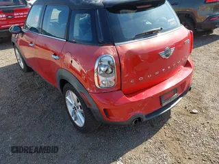 2013 MINI Countryman S z VIN WMWZC3C52DWP23887, wystawiony jako IAAI lot #42278143 z przebiegiem 63 625 mil mil oraz . Historia ofert i sprzedaży dostępna na DreamBid. Obrazek 6.