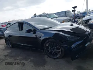 2023 Tesla Model 3 z VIN 5YJ3E1EA1PF546324, wystawiony jako IAAI lot #42103745 z przebiegiem 33 284 mil mil oraz . Historia ofert i sprzedaży dostępna na DreamBid. Obrazek 13.