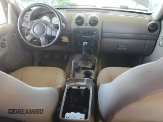 2003 Jeep Liberty Sport with VIN 1J4FK481X3W725304, listed as a Copart auction lot 87003384 with 185,646 mi miles and Salvage Title. Bid and sale history available at DreamBid. Image 8.