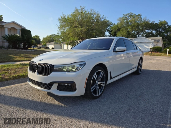 2017 BMW 7 Series 740i with VIN WBA7E2C54HG740427, listed as a Copart auction lot 54992345 with 93,252 mi miles and Clean Title. Bid and sale history available at carsss.com. Image 2.