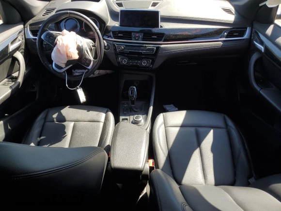 2021 BMW X1 sDrive28i with VIN WBXJG7C0XM5S33884, listed as a Copart auction lot 48413405 with 89,698 mi miles and Salvage Title. Bid and sale history available at DreamBid. Image 8.
