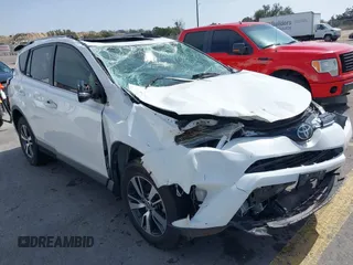 2018 Toyota RAV4 XLE with VIN JTMWFREV0JD132042, listed as a IAAI auction lot 41578567 with 102,365 mi miles. Bid and sale history available at carsss.com. Image 1.