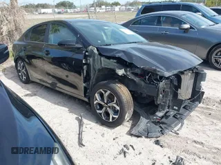 2021 Kia Forte LXS z VIN 3KPF24AD7ME394915, wystawiony jako IAAI lot #41380121 z przebiegiem 28 674 mil mil oraz . Historia ofert i sprzedaży dostępna na DreamBid. Obrazek 1.