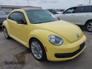 2013 Volkswagen Beetle with VIN 3VWHX7AT7DM604449, listed as a IAAI auction lot 42406666 with 104,874 mi miles and . Bid and sale history available at DreamBid. Image 1.
