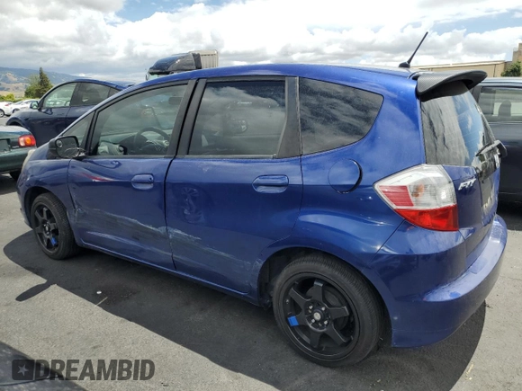 2009 Honda Fit with VIN JHMGE882X9C003678, listed as a Copart auction lot 56688265 with 141,003 mi miles and Salvage title. Bid and sale history available at DreamBid. Image 2.