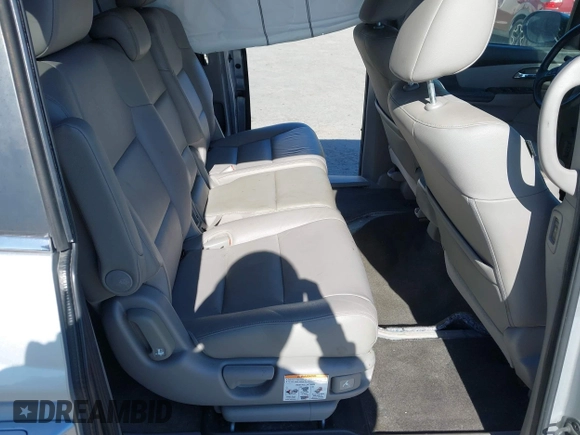 2014 Honda Odyssey EX-L with VIN 5FNRL5H63EB041106, listed as a IAAI auction lot 42294113 with 122,610 mi miles and . Bid and sale history available at DreamBid. Image 8.