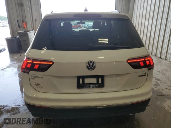 2018 Volkswagen Tiguan SEL z VIN 3VV2B7AX9JM182885, wystawiony jako Copart lot #60194295 z przebiegiem 101 861 mil mil oraz Czysty tytuł • Clean title. Historia ofert i sprzedaży dostępna na DreamBid. Obrazek 6.