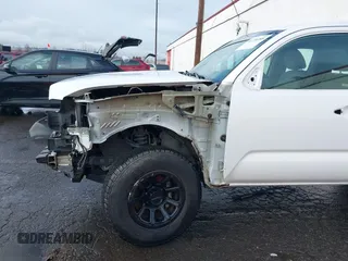 2016 Toyota Tacoma SR with VIN 5TFRX5GN0GX071038, listed as a IAAI auction lot 41176395 with 160,803 mi miles and . Bid and sale history available at DreamBid. Image 18.
