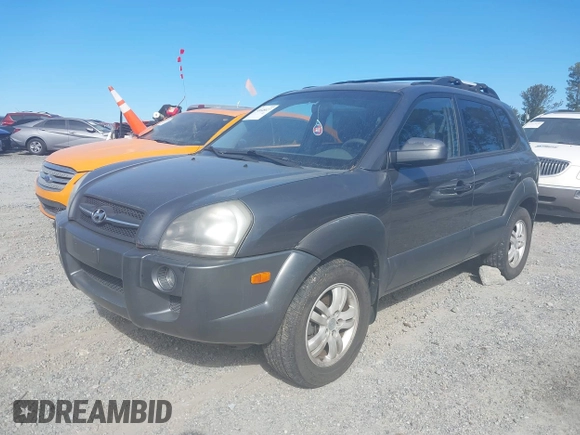 2007 Hyundai Tucson SE with VIN KM8JN12DX7U635740, listed as a IAAI auction lot 41648027 with 169,967 mi miles. Bid and sale history available at carsss.com. Image 2.