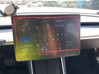 2018 Tesla Model 3 Long Range Battery with VIN 5YJ3E1EAXJF108781, listed as a IAAI auction lot 41962628 with 61,208 mi miles and . Bid and sale history available at DreamBid. Image 19.