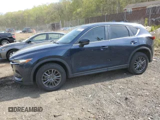2019 Mazda CX-5 Touring with VIN JM3KFBCM6K0591608, listed as a Copart auction lot 53518385 with 61,618 mi miles and Salvage Title. Bid and sale history available at carsss.com. Image 1.