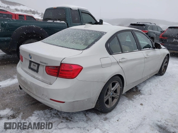2014 BMW 3 Series 328i with VIN WBA3C1C51EK106435, listed as a IAAI auction lot 41202983 with 142,135 mi miles. Bid and sale history available at carsss.com. Image 4.
