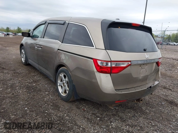 2012 Honda Odyssey EX-L with VIN 5FNRL5H68CB031930, listed as a IAAI auction lot 42222501 with 65,262 mi miles and . Bid and sale history available at DreamBid. Image 3.