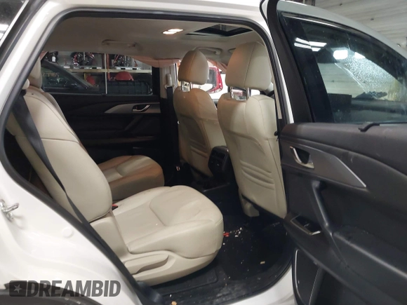 2020 Mazda CX-9 Touring z VIN JM3TCBCY8L0405360, wystawiony jako IAAI lot #41419428 z przebiegiem 69 917 mil mil oraz . Historia ofert i sprzedaży dostępna na DreamBid. Obrazek 8.