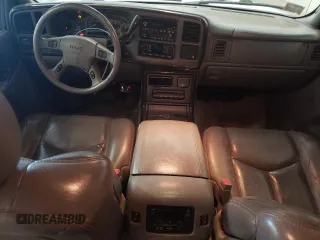 2003 GMC Yukon Denali z VIN 1GKEK63U23J136487, wystawiony jako Copart lot #57974035 z przebiegiem 280 637 mil mil oraz Tytuł czysty. Historia ofert i sprzedaży dostępna na DreamBid. Obrazek 8.
