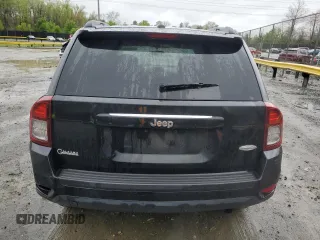 2014 Jeep Compass Latitude with VIN 1C4NJCEB8ED628192, listed as a Copart auction lot 51836275 with 217,987 mi miles and Clean Title. Bid and sale history available at carsss.com. Image 6.