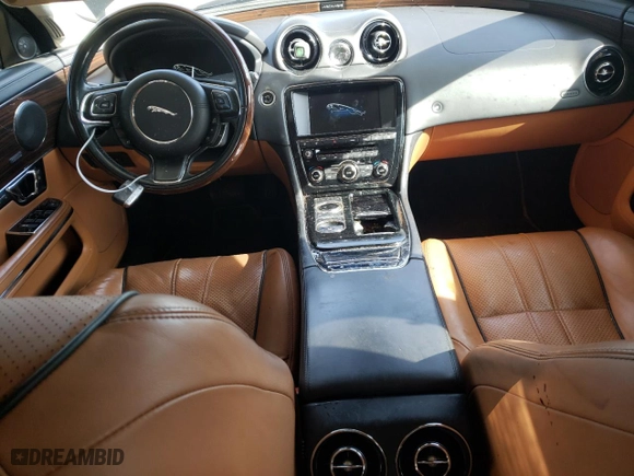 2015 Jaguar XJ with VIN SAJWA2GZ1F8V85688, listed as a Copart auction lot 43112915 with 0 mi miles and Salvage Title. Bid and sale history available at carsss.com. Image 8.