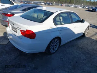 2011 BMW 3 Series 328i with VIN WBAPH7C57BE675578, listed as a IAAI auction lot 41844032 with 57,324 mi miles. Bid and sale history available at carsss.com. Image 4.