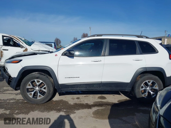 2018 Jeep Cherokee Trailhawk with VIN 1C4PJMBX7JD550173, listed as a IAAI auction lot 41094306 with 74,128 mi miles. Bid and sale history available at carsss.com. Image 14.