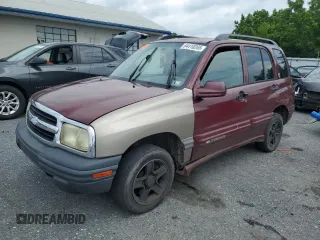 2003 Chevrolet Tracker LT with VIN 2CNBJ634136946882, listed as a Copart auction lot 64410265 with 164,809 mi miles and Salvage title. Bid and sale history available at DreamBid. Image 1.
