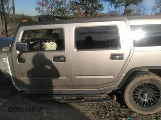 2003 Hummer H2 with VIN 5GRGN23U33H110037, listed as a IAAI auction lot 41339142 with 166,795 mi miles. Bid and sale history available at carsss.com. Image 14.