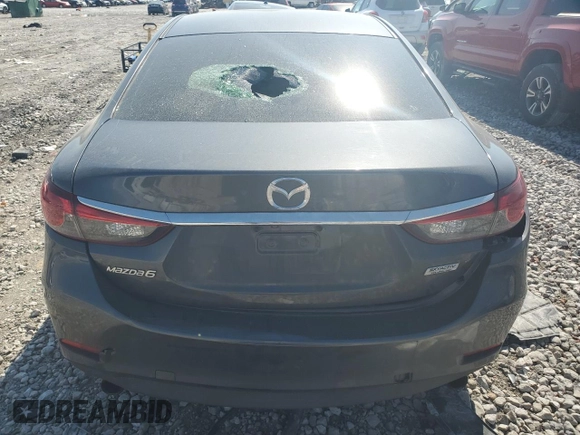 2016 Mazda Mazda6 i Touring with VIN JM1GJ1V51G1402829, listed as a Copart auction lot 74257984 with 134,648 mi miles and Salvage Title. Bid and sale history available at carsss.com. Image 6.