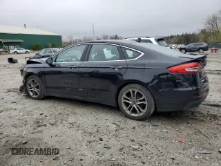 2020 Ford Fusion Titanium with VIN 3FA6P0RU5LR141328, listed as a Copart auction lot 55718165 with 94,536 mi miles and Non repairable. Bid and sale history available at DreamBid. Image 2.