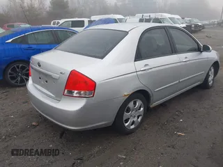 2008 Kia Spectra EX with VIN KNAFE122885522404, listed as a IAAI auction lot 41918687 with 127,060 mi miles. Bid and sale history available at carsss.com. Image 4.