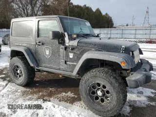 2011 Jeep Wrangler Rubicon with VIN 1J4BA6D1XBL556808, listed as a Copart auction lot 87358534 with 196,139 mi miles and Clean Title. Bid and sale history available at carsss.com. Image 4.