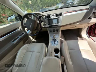 2008 Chrysler Sebring Limited z VIN 1C3LC65M98N197109, wystawiony jako Copart lot #58816155 z przebiegiem 76 731 mil mil oraz Tytuł czysty. Historia ofert i sprzedaży dostępna na DreamBid. Obrazek 9.