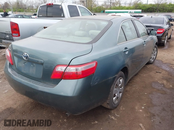 2009 Toyota Camry with VIN 4T4BE46K39R087412, listed as a IAAI auction lot 42035372 with 118,234 mi miles and . Bid and sale history available at carsss.com. Image 4.