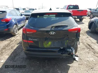 2019 Hyundai Tucson SE with VIN KM8J2CA4XKU852946, listed as a IAAI auction lot 41784214 with 120,857 mi miles. Bid and sale history available at carsss.com. Image 6.
