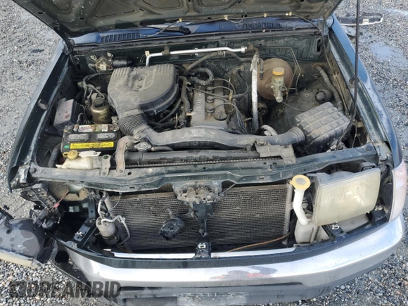 1999 Nissan Frontier XE with VIN 1N6DD26S6XC332458, listed as a Copart auction lot 48028715 with 182,706 mi miles and Salvage title. Bid and sale history available at DreamBid. Image 12.