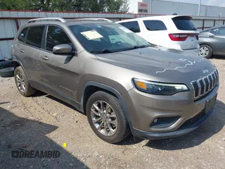 2019 Jeep Cherokee Latitude Plus with VIN 1C4PJLLBXKD164846, listed as a IAAI auction lot 42424852 with 66,842 mi miles and . Bid and sale history available at DreamBid. Image 1.