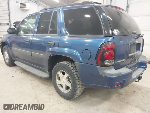 2005 Chevrolet TrailBlazer LT with VIN 1GNDT13S652299380, listed as a IAAI auction lot 42136545 with 153,406 mi miles and . Bid and sale history available at DreamBid. Image 3.
