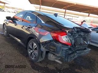 2018 Honda Civic EX-L z VIN JHMFC1F8XJX033602, wystawiony jako IAAI lot #42161015 z przebiegiem 99 597 mil mil oraz . Historia ofert i sprzedaży dostępna na DreamBid. Obrazek 3.
