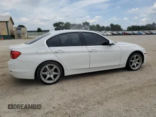 2012 BMW 3 Series 328i with VIN WBA3A5C55CF259337, listed as a Copart auction lot 63327925 with 132,019 mi miles and Salvage title. Bid and sale history available at DreamBid. Image 3.