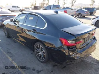 2021 BMW 3 Series 330i with VIN 3MW5R1J08M8B51760, listed as a IAAI auction lot 41605331 with 29,455 mi miles. Bid and sale history available at carsss.com. Image 3.