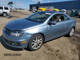2014 Volkswagen Eos Komfort with VIN WVWBW8AH5EV004209, listed as a Copart auction lot 52424035 with 151,610 mi miles and Clean Title. Bid and sale history available at DreamBid. Image 1.