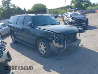 2003 GMC Yukon XL Denali with VIN 1GKFK66U43J302153, listed as a IAAI auction lot 41217747 with 198,228 mi miles. Bid and sale history available at carsss.com. Image 1.