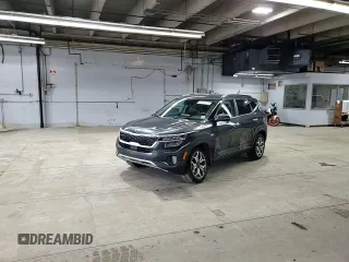2021 Kia Seltos SX with VIN KNDETCA2XM7167199, listed as a Copart auction lot 52080495 with 82,981 mi miles and Salvage Title. Bid and sale history available at carsss.com. Image 11.