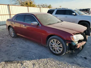 2012 Chrysler 300 C with VIN 2C3CCAKT3CH197140, listed as a Copart auction lot 82628384 with 167,304 mi miles and Salvage Title. Bid and sale history available at DreamBid. Image 4.