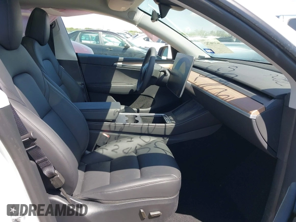 2024 Tesla Model Y with VIN 7SAYGDED0RA327806, listed as a IAAI auction lot 42096752 with 13,244 mi miles and . Bid and sale history available at DreamBid. Image 5.