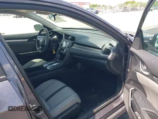 2020 Honda Civic LX with VIN 19XFC2F68LE007735, listed as a IAAI auction lot 42215294 with 3,849 mi miles and . Bid and sale history available at DreamBid. Image 5.