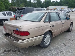 1993 Ford Taurus with VIN 1FALP5343PA153390, listed as a IAAI auction lot 42559003 with 64,617 mi miles and . Bid and sale history available at DreamBid. Image 4.