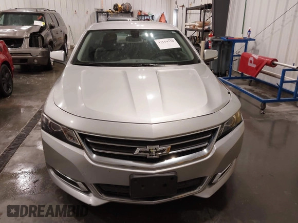 2014 Chevrolet Impala LT with VIN 2G1115SL4E9250806, listed as a IAAI auction lot 42119330 with 98,618 mi miles and . Bid and sale history available at DreamBid. Image 12.