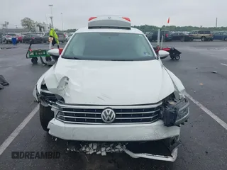 2016 Volkswagen Passat SE z VIN 1VWBS7A31GC018050, wystawiony jako IAAI lot #42226752 z przebiegiem 123 610 mil mil oraz . Historia ofert i sprzedaży dostępna na DreamBid. Obrazek 12.